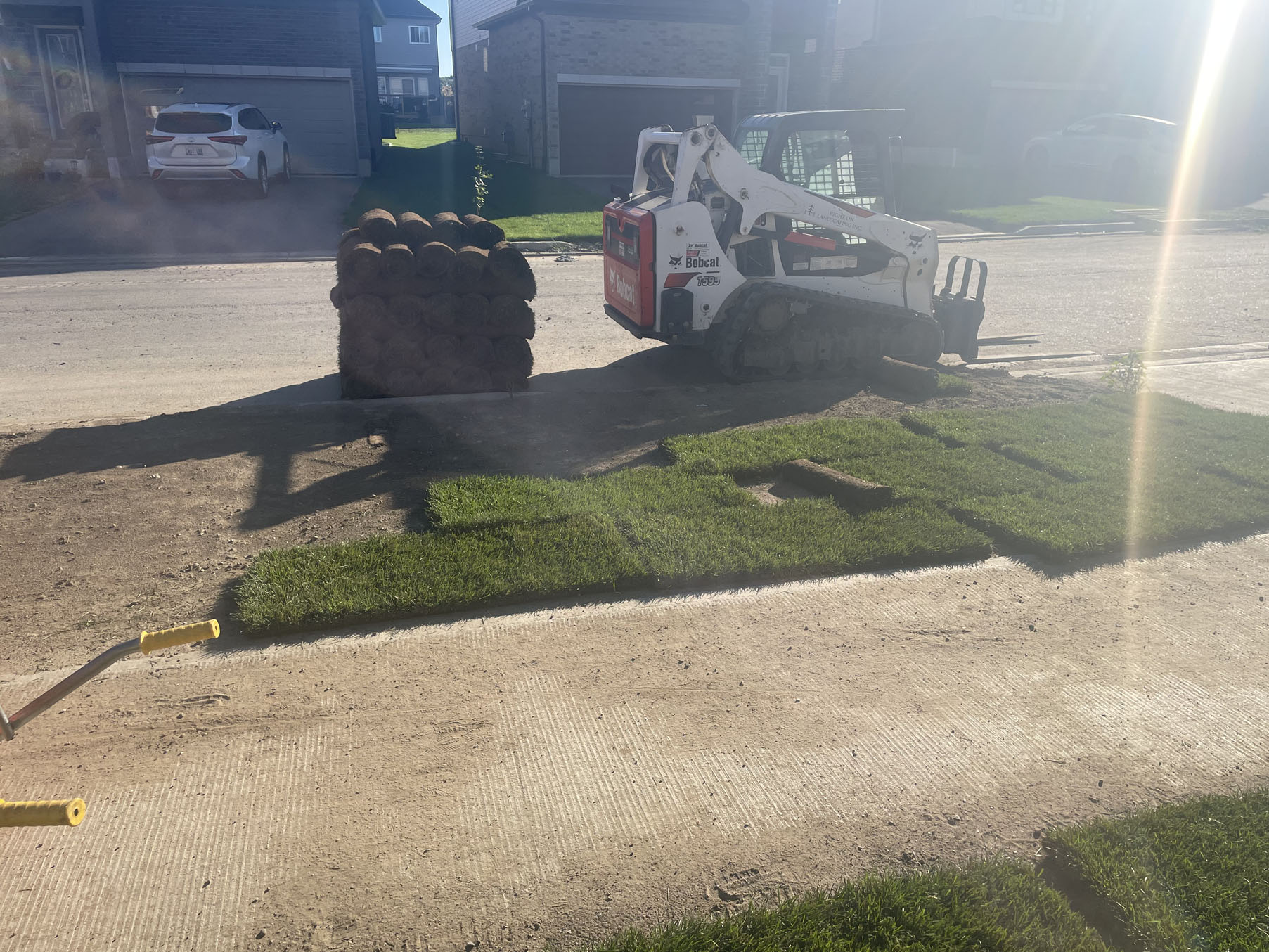 Beautiful fresh sod installation in backyard